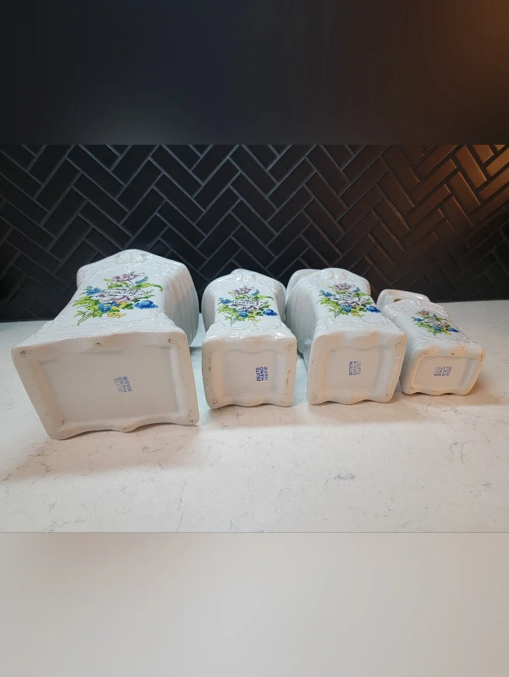 Set Of 4 Delfts Hand Made White Floral Ceramic Canisters